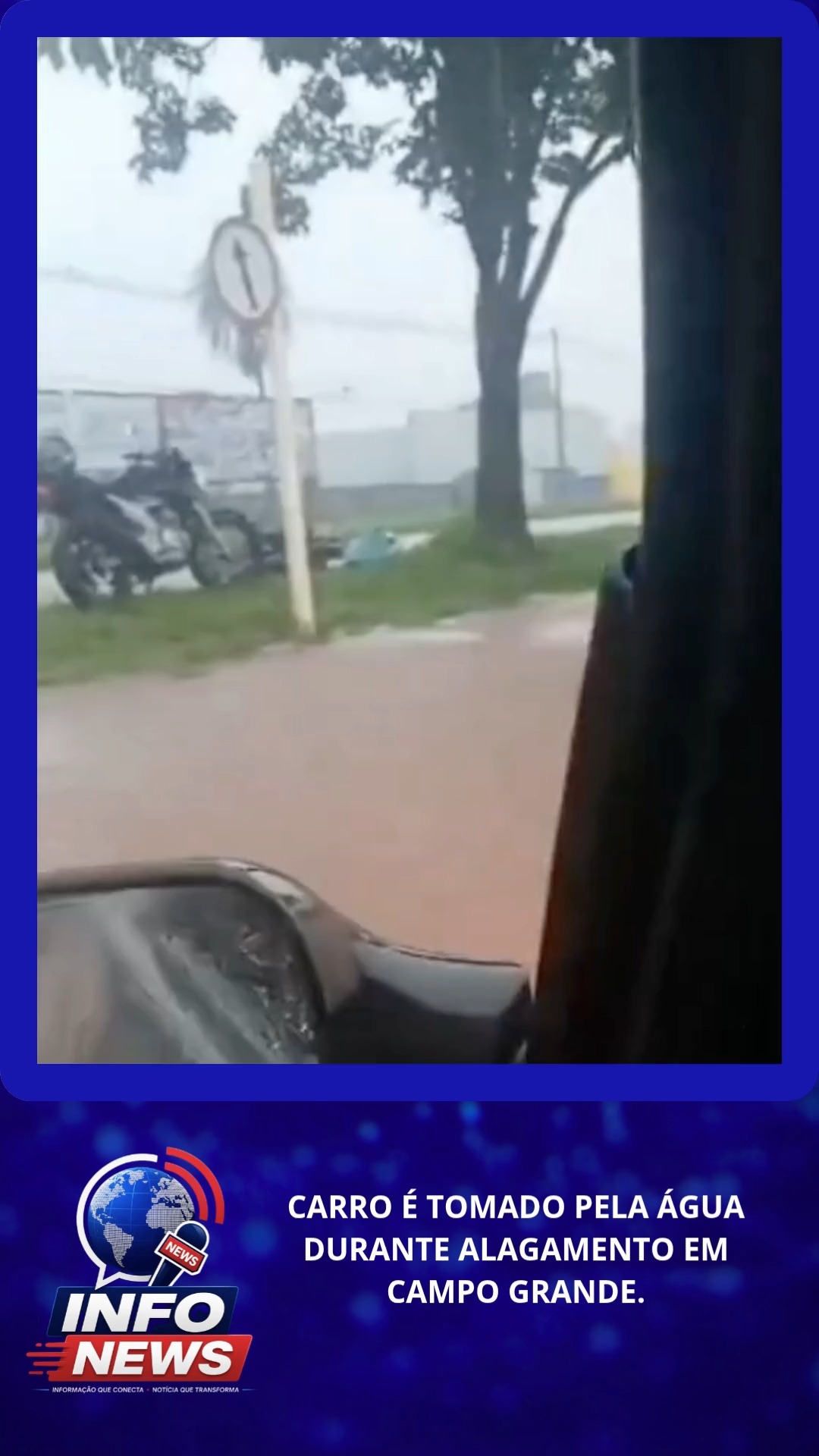 CARRO É TOMADO PELA ÁGUA DURANTE ALAGAMENTO EM CAMPO GRANDE